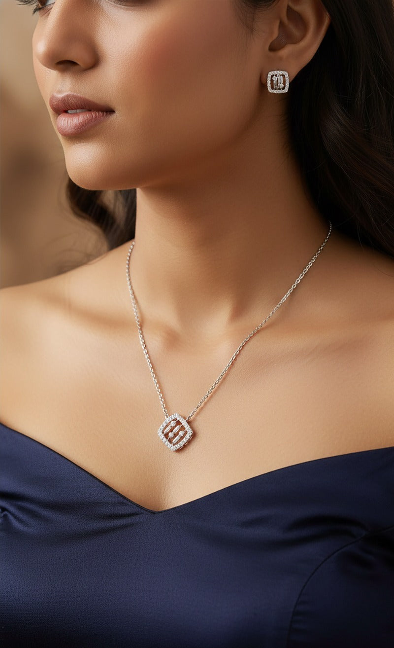 Lady wearing 18K white gold diamond cushion necklace set, evening and party wear for Emirati and Khaleeji women, J.H. Jewellers Dubai.