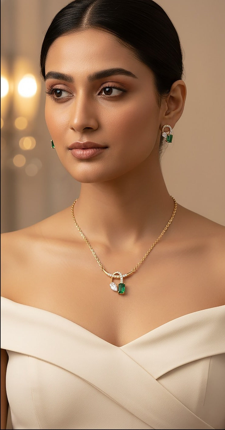 Woman wearing an 18K yellow gold diamond and emerald necklace set, ideal for Emirati and Khaleeji ladies at parties and weddings