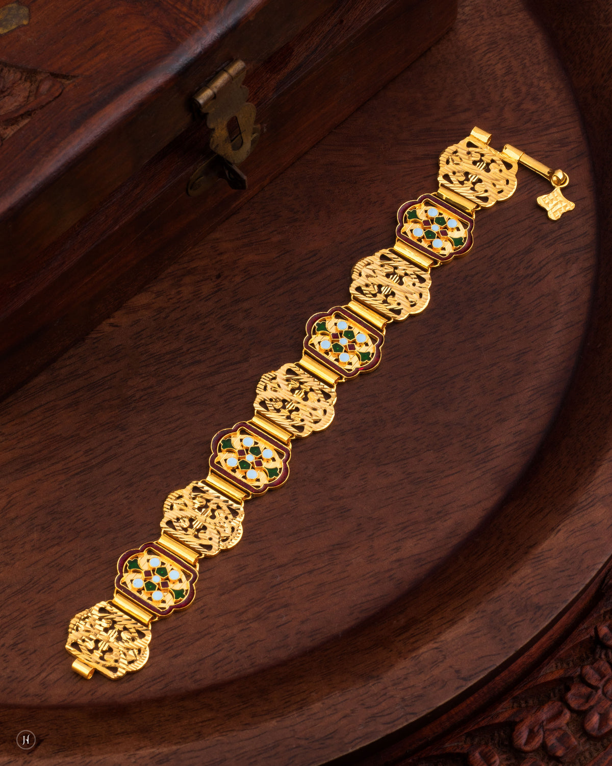 21K yellow gold bracelet features floral meena enamel panels