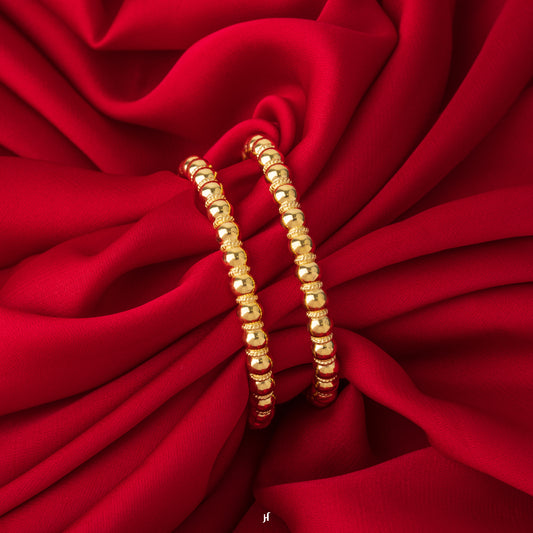 21Karat Yellow Gold Ball Screw Bangles for baby girls in UAE