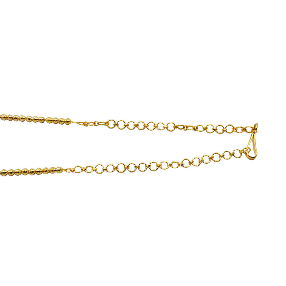 Rib Eye Hook on 21K Yellow Gold Bahrain Dangling Disco Balls Rope Necklace