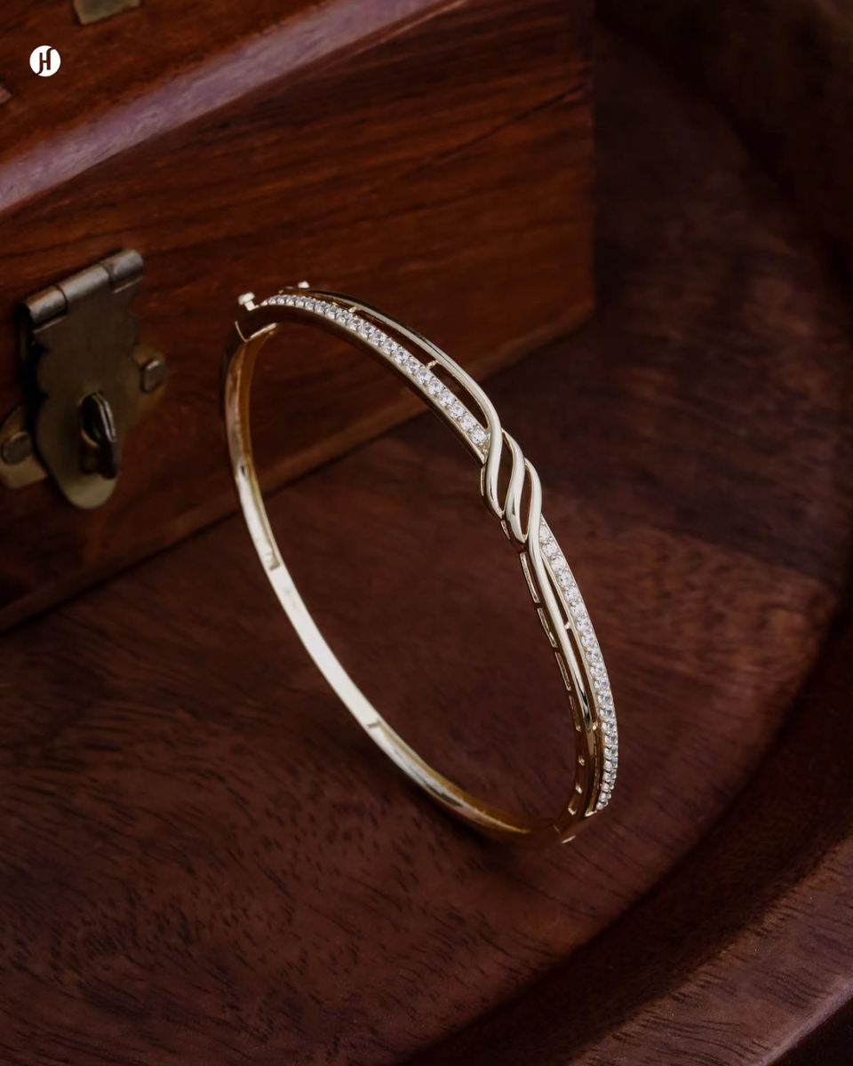 18K Yellow Gold Italian Zircon Twist Bangle | Party Wear – J.H.