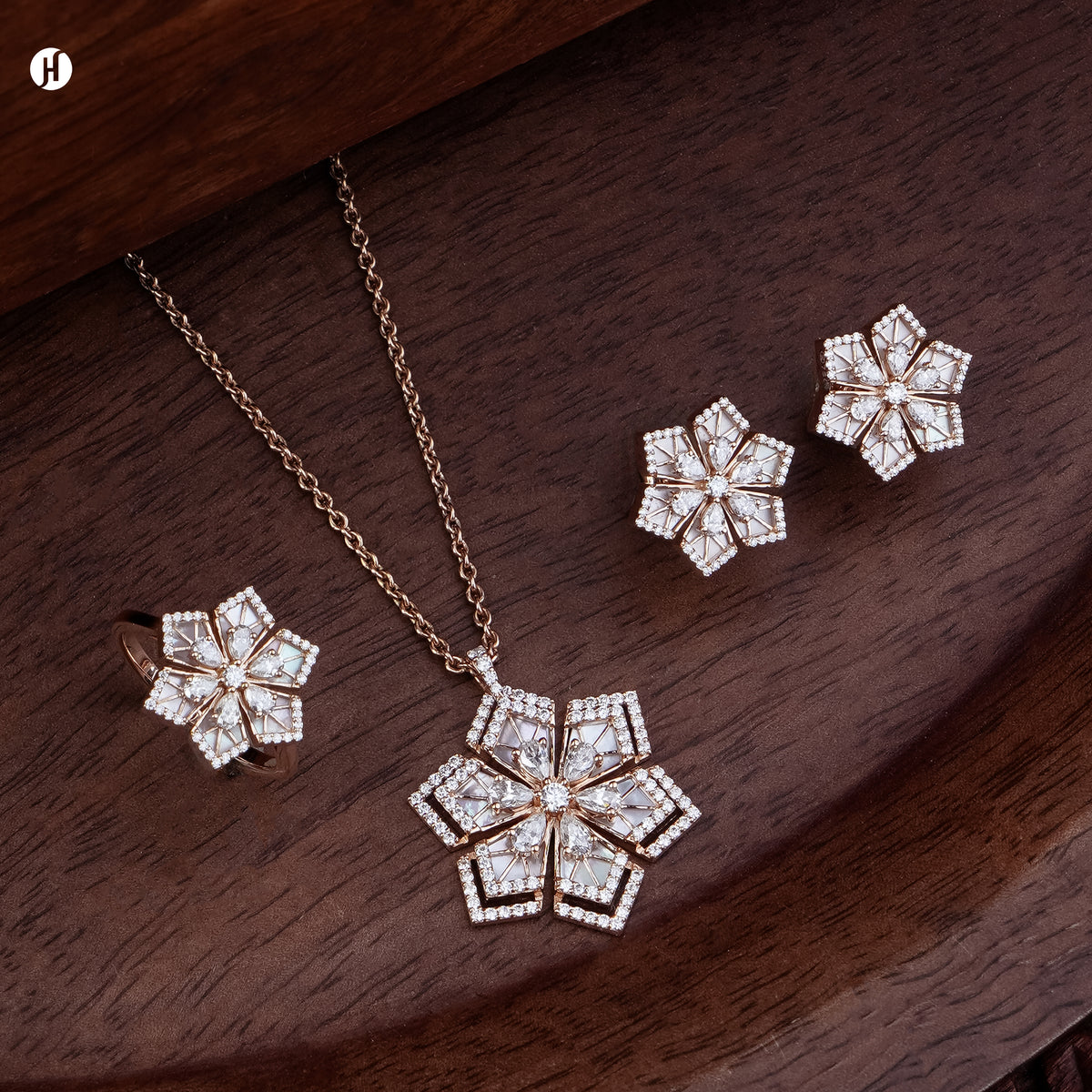 18K rose gold Italian mother-of-pearl flower necklace set with matching earrings and ring, loved by Emirati and Khaleeji ladies — JH Jewellers, Dubai, UAE