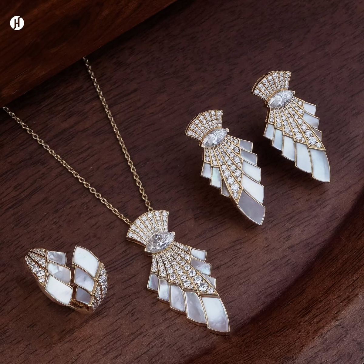 18K yellow gold Italian mother-of-pearl fan necklace set with matching earrings and ring, loved by Emirati and Khaleeji ladies — JH Jewellers, Dubai, UAE