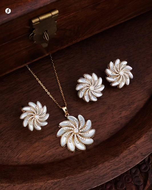 18K yellow gold Italian pinwheel set in mother-of-pearl and moissanite with matching earrings and ring — JH Jewellers, UAE