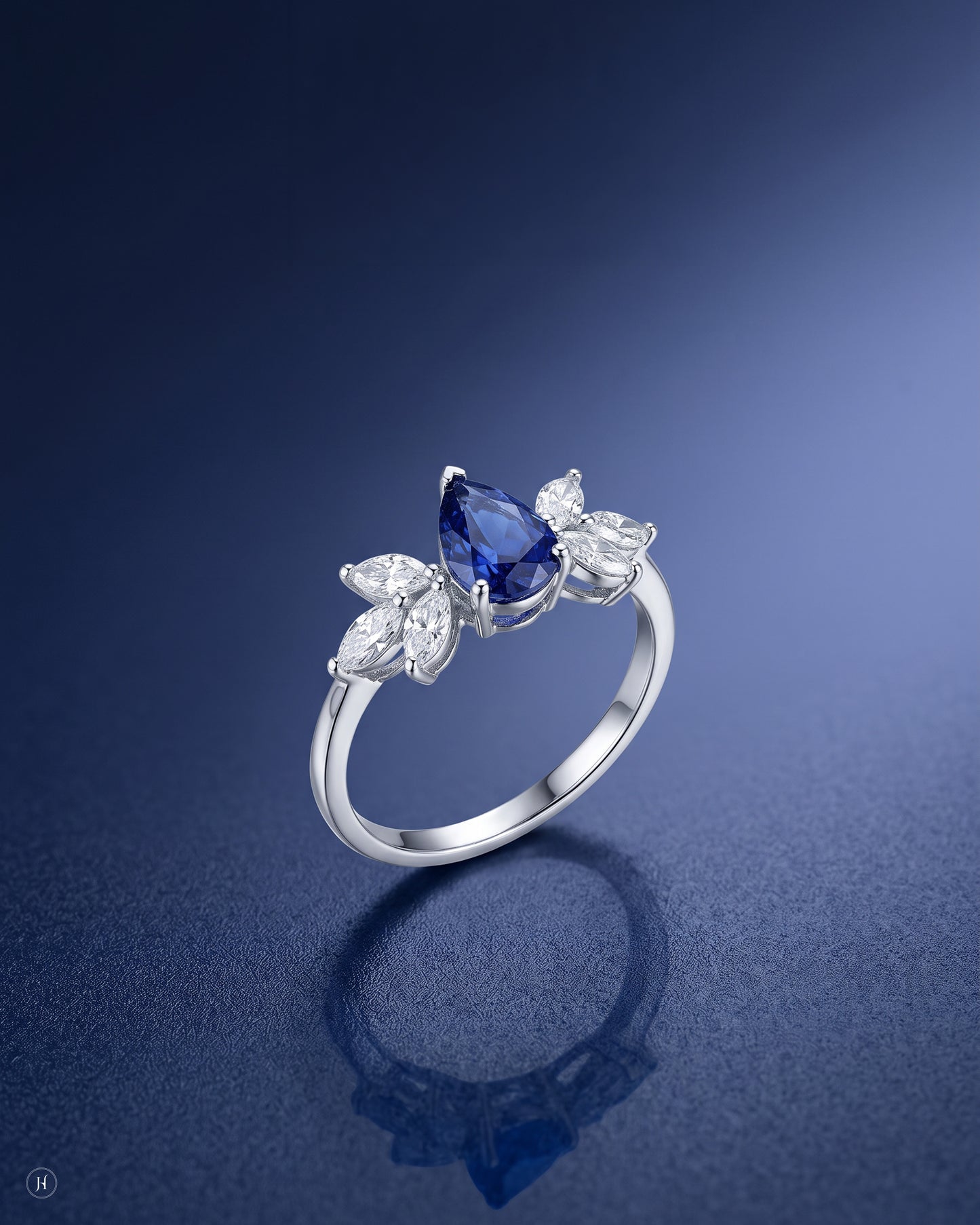 18K white gold blue sapphire pear ring matching the leaf necklace set, wedding and party wear, J.H. by Priyansh Jewellery, Dubai, UAE.
