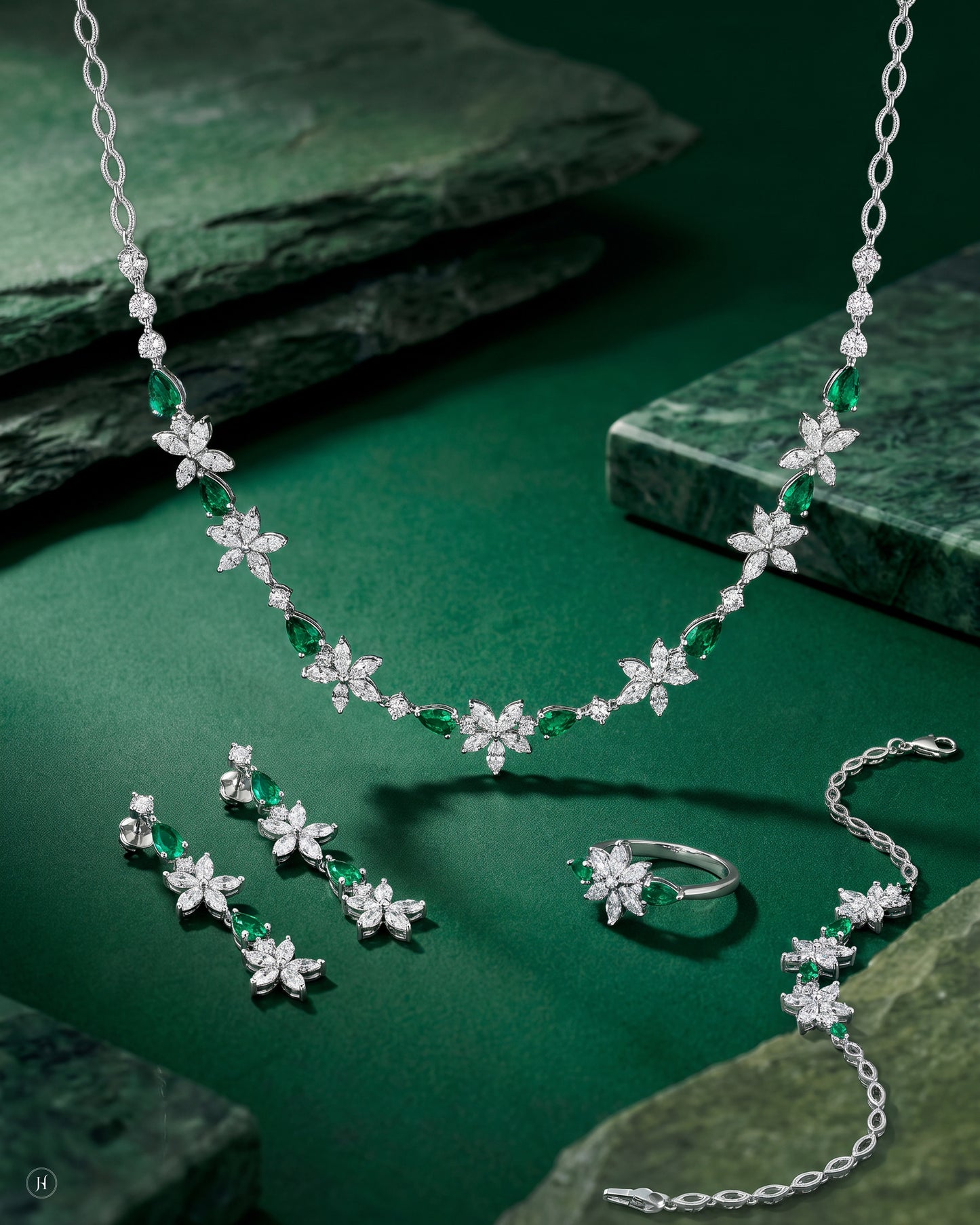 18K white gold emerald and zircon marquise flower necklace set with matching earrings, bracelet and ring, green emerald and white zircon wedding and party wear, J.H. by Priyansh Jewellery, Dubai, UAE.