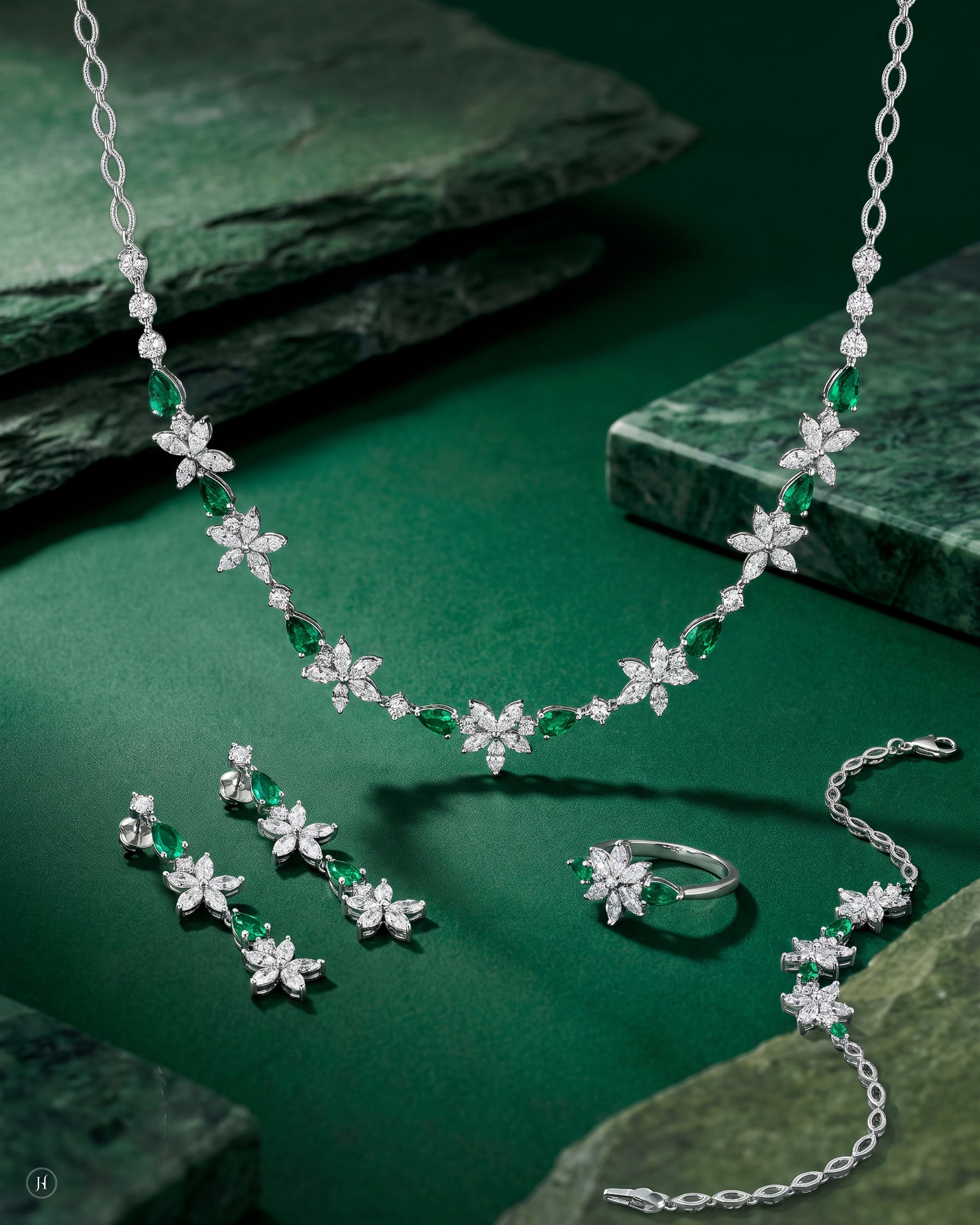 18K white gold emerald and zircon marquise flower necklace set with matching earrings, bracelet and ring, green emerald and white zircon wedding and party wear, J.H. by Priyansh Jewellery, Dubai, UAE.