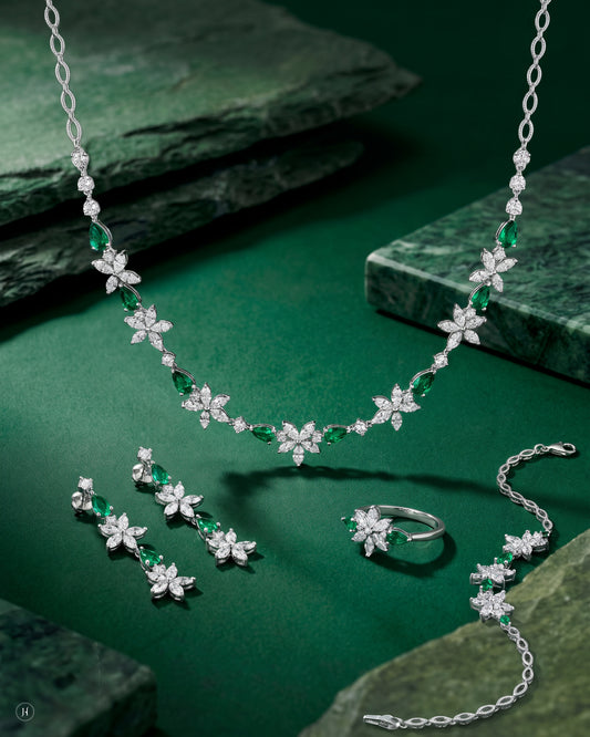 18K white gold emerald and zircon marquise flower necklace set with matching earrings, bracelet and ring, green emerald and white zircon wedding and party wear, J.H. by Priyansh Jewellery, Dubai, UAE.