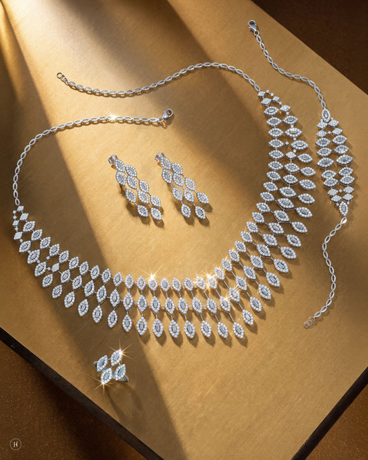 18K white gold Italian zircon halo cluster necklace set with matching ring, earrings and bracelet, white and yellow zircon wedding and party wear, J.H. by Priyansh Jewellery, Dubai, UAE.
