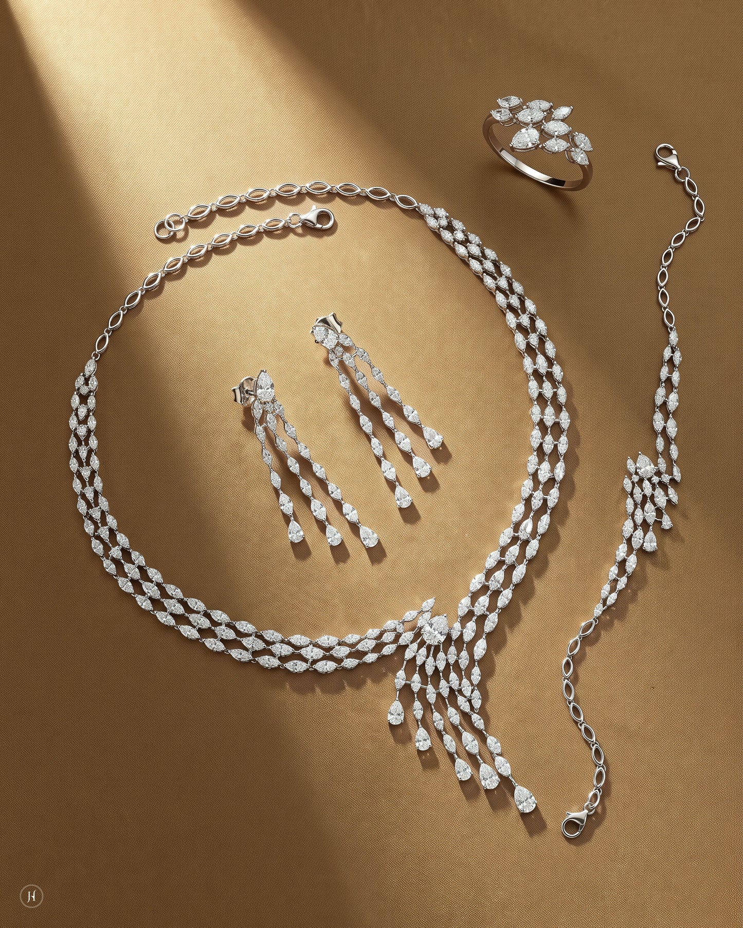 18K white gold Italian zircon leaf vine necklace set with matching earrings, bracelet and ring, white and yellow zircon wedding and party wear, J.H. by Priyansh Jewellery, Dubai, UAE.