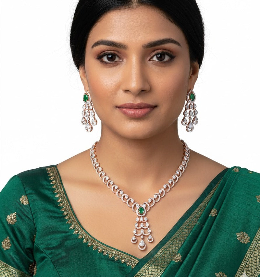 Woman wearing rose gold diamond and emerald necklace set — party wear and gifting jewelry in Dubai, UAE