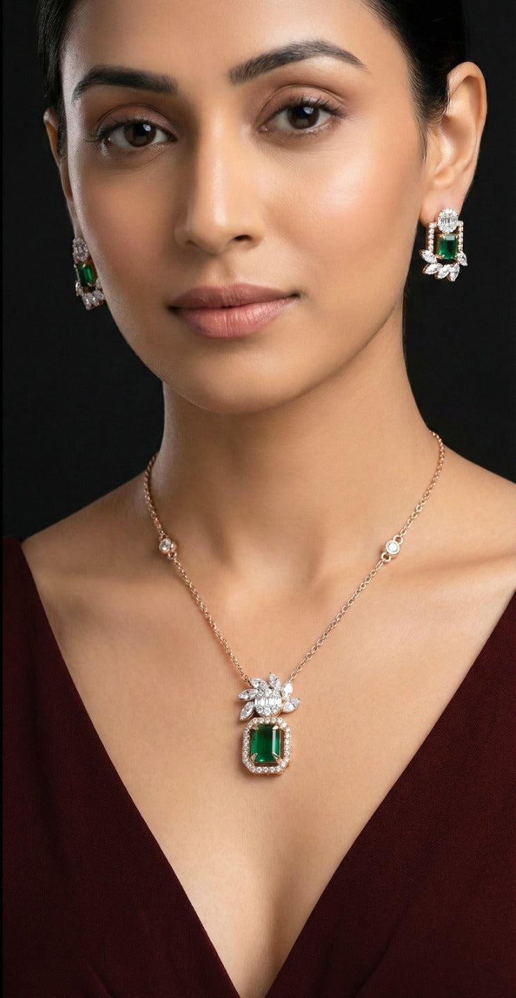 Woman wearing an 18K rose gold diamond and emerald necklace set, ideal for Emirati and Khaleeji ladies at parties and weddings