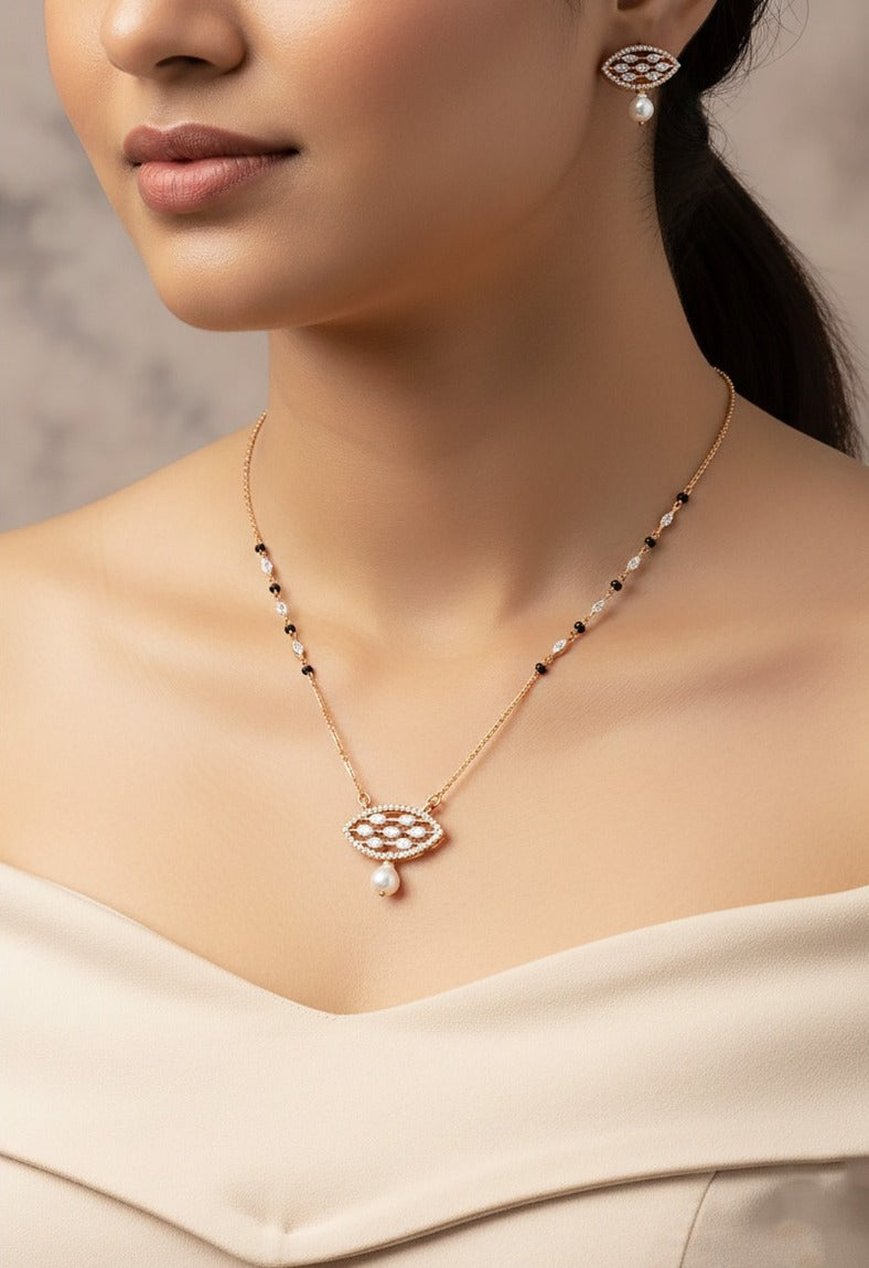 Woman wearing an 18K rose gold diamond and pearl necklace set, perfect for daily wear and gifting