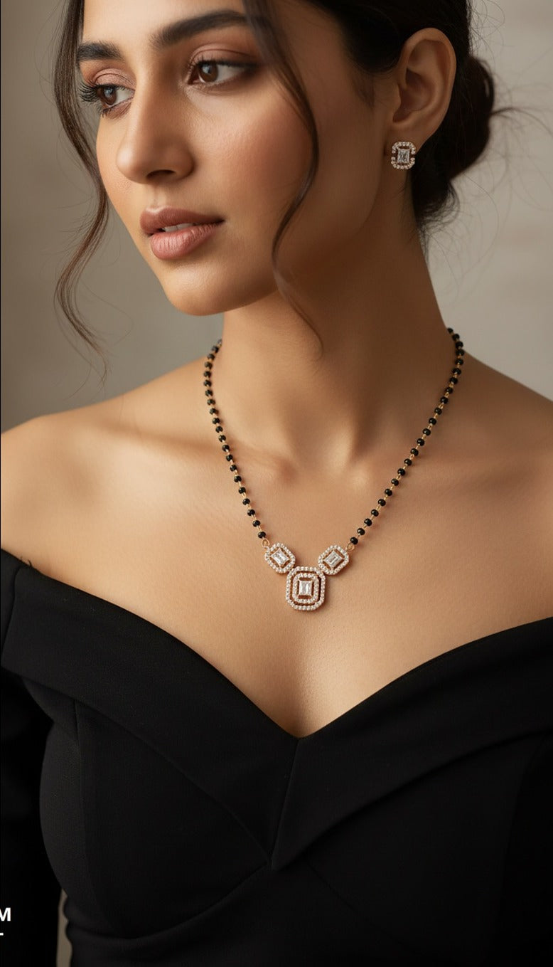 Lady wearing 18K rose gold diamond necklace set with black beads, daily wear and gift jewellery, J.H. Jewellers Dubai UAE.