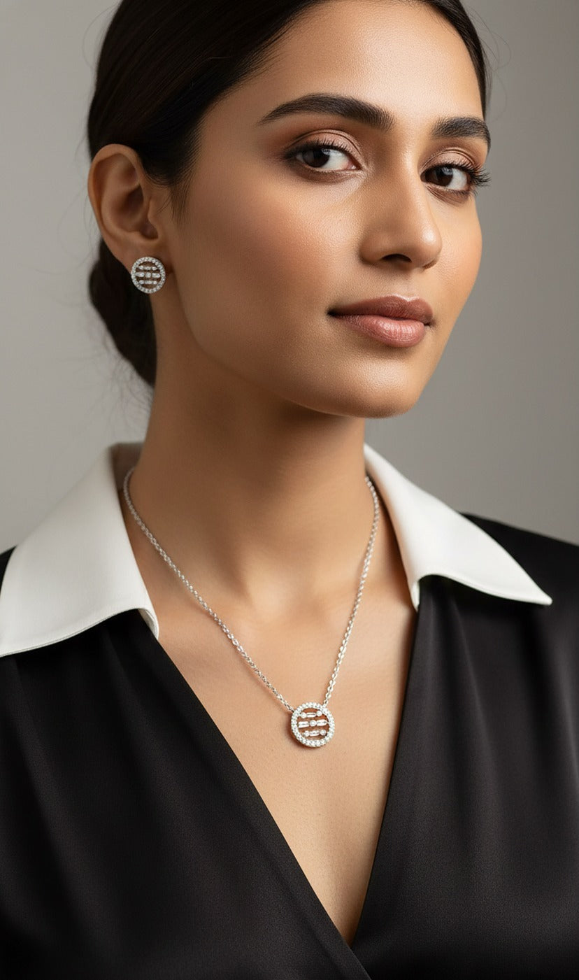 Lady wearing 18K white gold diamond circle necklace set, evening and party wear for Emirati and Khaleeji women, J.H. Jewellers Dubai.