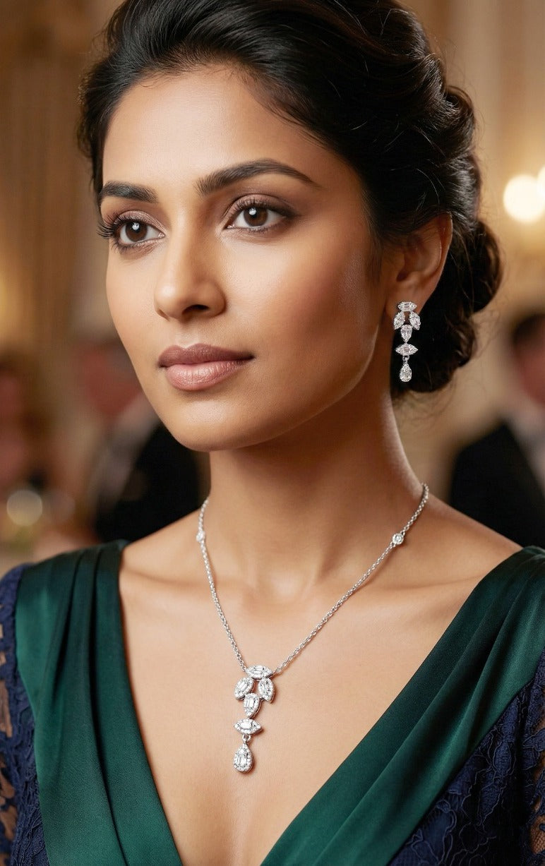 Woman wearing an 18K white gold diamond marquise-drop necklace set, ideal for Emirati and Khaleeji ladies at parties and weddings