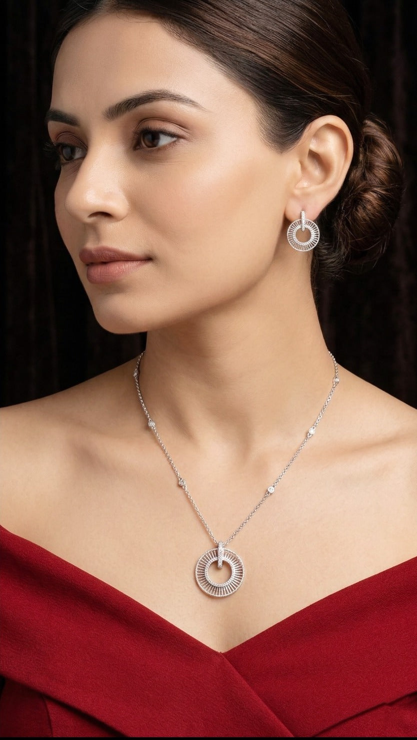 Lady wearing 18K white gold diamond sunray circle necklace set, evening and party wear for Emirati and Khaleeji women, J.H. Jewellers Dubai.