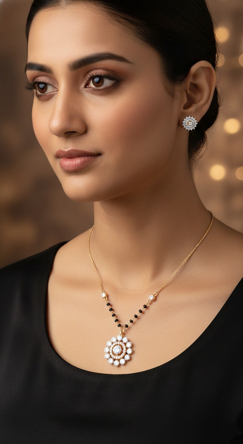 Lady wearing 18K yellow gold diamond floral necklace set with black beads, daily wear and gift jewellery, J.H. Jewellers Dubai UAE.