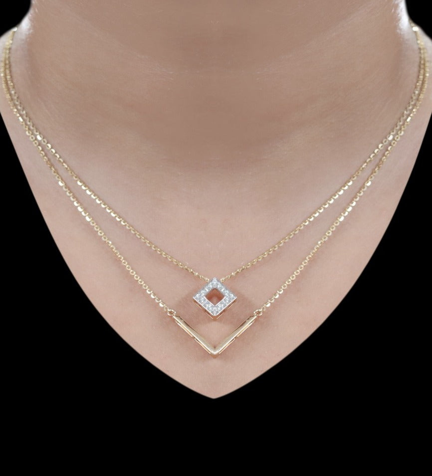 Lady wearing 18K yellow gold diamond layered necklace, daily and party wear for Emirati and Khaleeji women, J.H. Jewellers Dubai.
