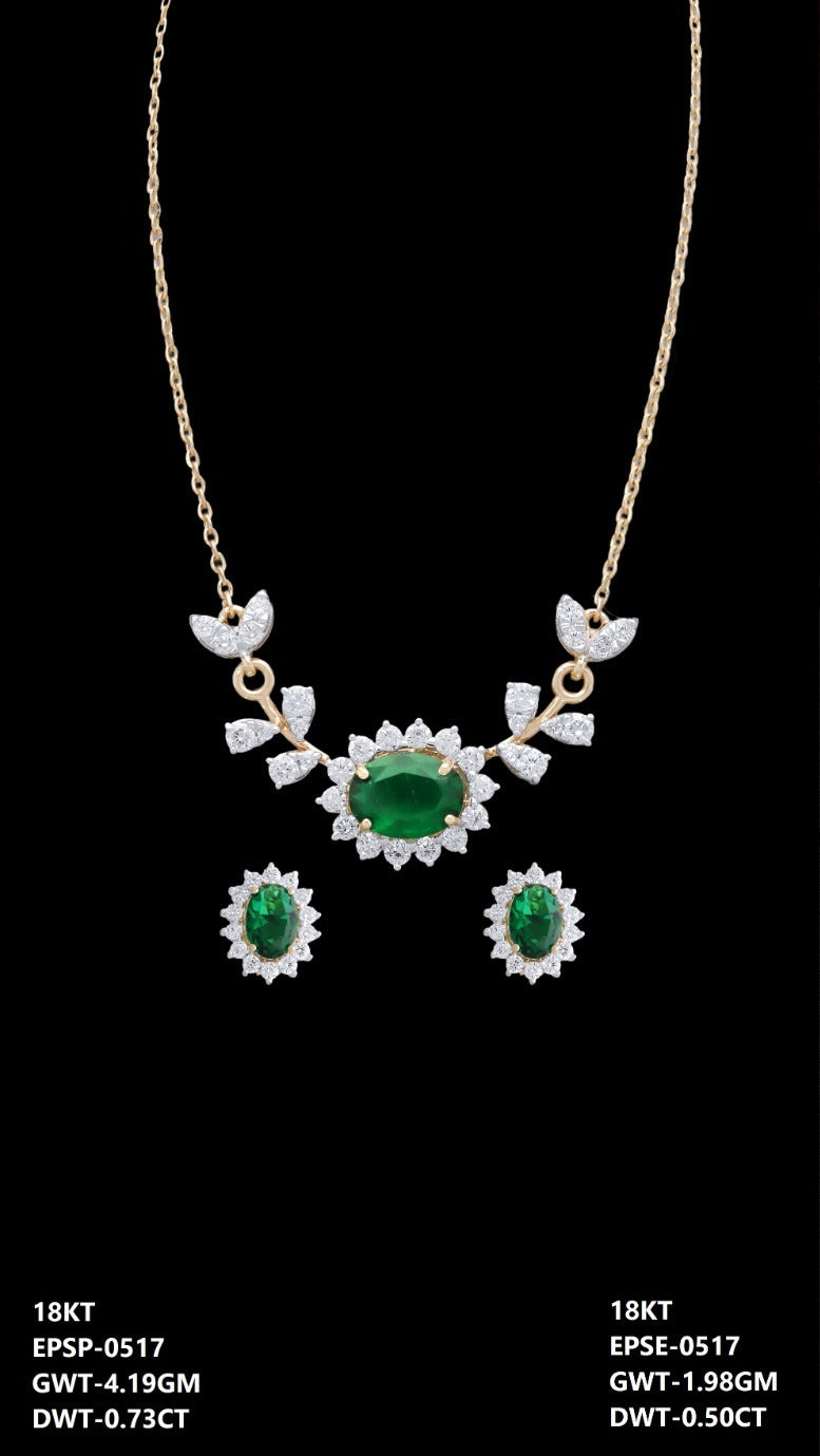18K Italian yellow gold emerald and diamond oval necklace and earrings set, party wear jewellery from J.H. Jewellers, Dubai UAE.