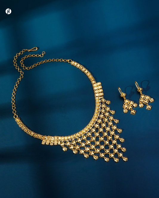 21K Yellow Gold Bahraini Chandelier Drape Necklace Set | jewelry design is perfect for weddings, and special occasions, making a bold and luxurious statement for women in Bahrain, Saudi Arabia, Kuwait, and across the Gulf. It complements any outfit, including the Abaya and Jalabiya.