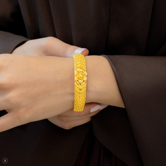 21K Yellow Gold Bahraini Flower Motif Bangle of ladies in uae