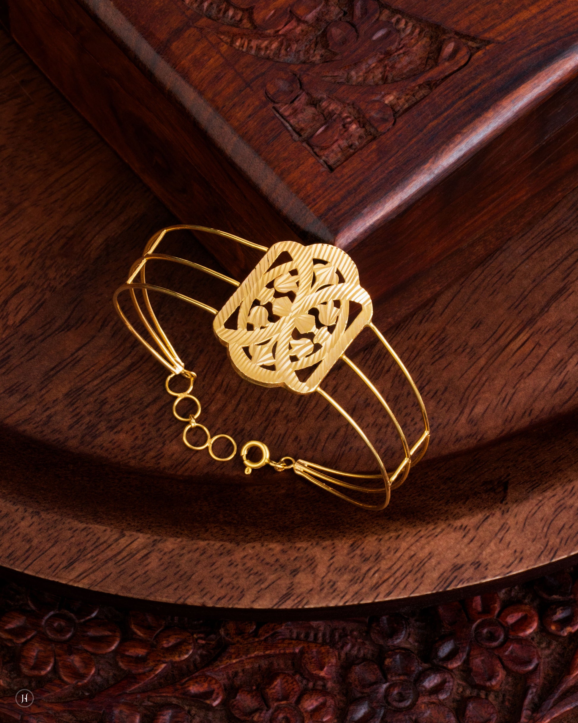 21K Yellow Gold Floral Motif Adjustable Bangle for Khaleeji women in UAE.