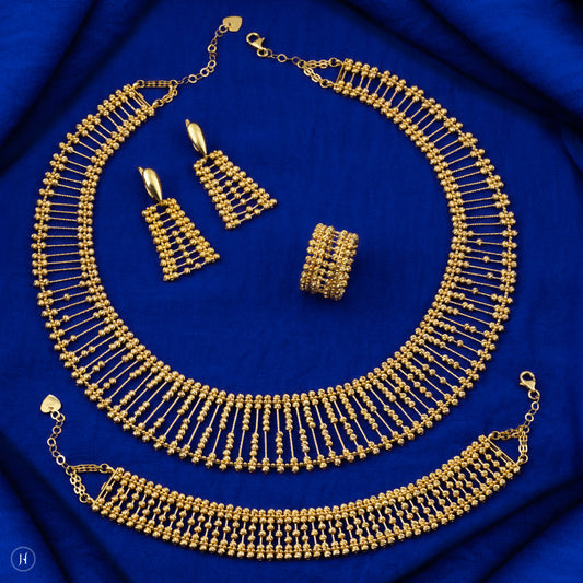 This 21K yellow gold Bahraini bridal choker set features an elegant lattice multi-beaded design adorned with delicate beads. The set includes a matching pair of drop earrings with fish hook closures, a bracelet, and a ring, completing the luxurious ensemble.

Perfect for brides, this choker set adds timeless charm to wedding celebrations and other special occasions. It also makes a thoughtful and precious gift for your daughter, sister, or wife, symbolizing love and elegance.