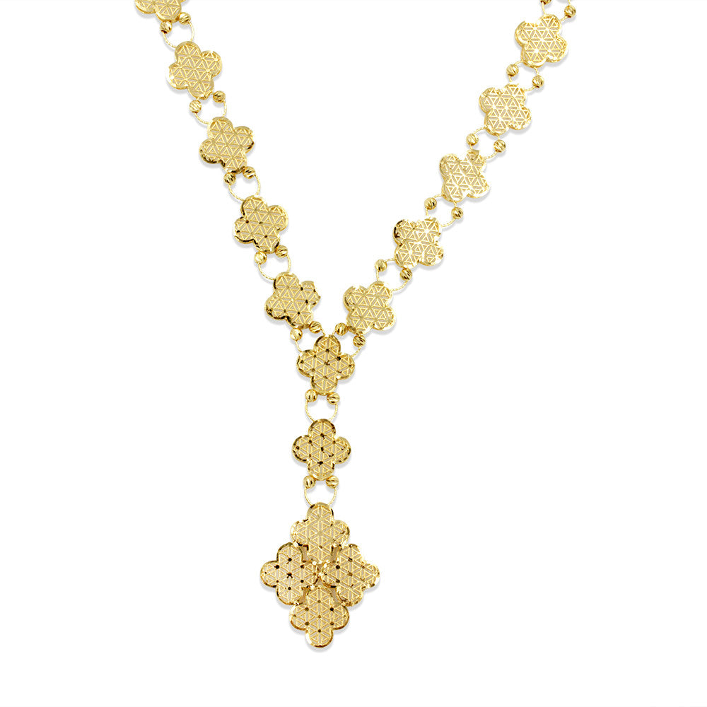 Close up of 21K yellow gold 4 clover leaf necklace with triangular detailing
