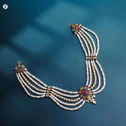 21K yellow gold Pakistani multi-strand freshwater pearl choker with ruby, emerald, sapphire and turquoise stations