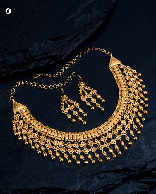21Karat Yellow Gold Bahraini Floral Dangling Bridal Necklace Set for Women.