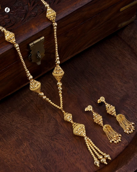 21Karat Yellow Gold Bahraini Lantern Long Necklace Set | perfect for Eid Al Adha, weddings, parties, and special occasions, making a bold and luxurious statement for Khaleeji and Emirati women. It complements any outfit, including the Abaya.