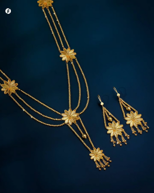 21K yellow gold Bahraini floral tassel layered long necklace set with matching earrings, loved by Emirati and Khaleeji women, J.H. Jewellers, Shop No. 13/14, Block No. 8, New Central Market, Sharjah, UAE.