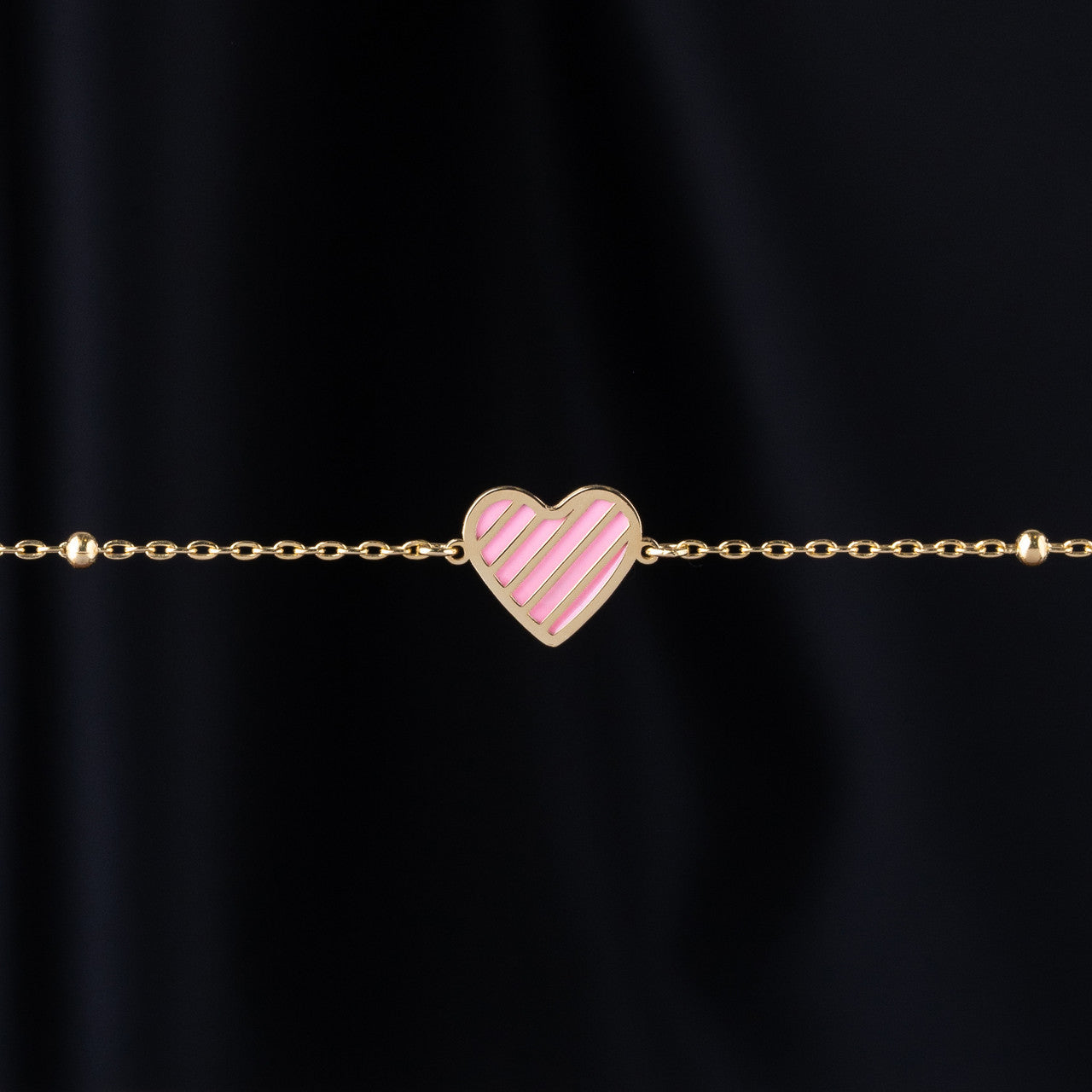 18K Yellow Gold Pink-Heart Baby Bracelet
BABY JEWELLERY DUBAI
GOLD BABY JEWELLERY SET
SHARJAH GOLD SOUQ
GOLD GIFT FOR BABY GIRL