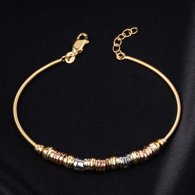 18K Italian Yellow Gold Baby Bangle with Playful Circles