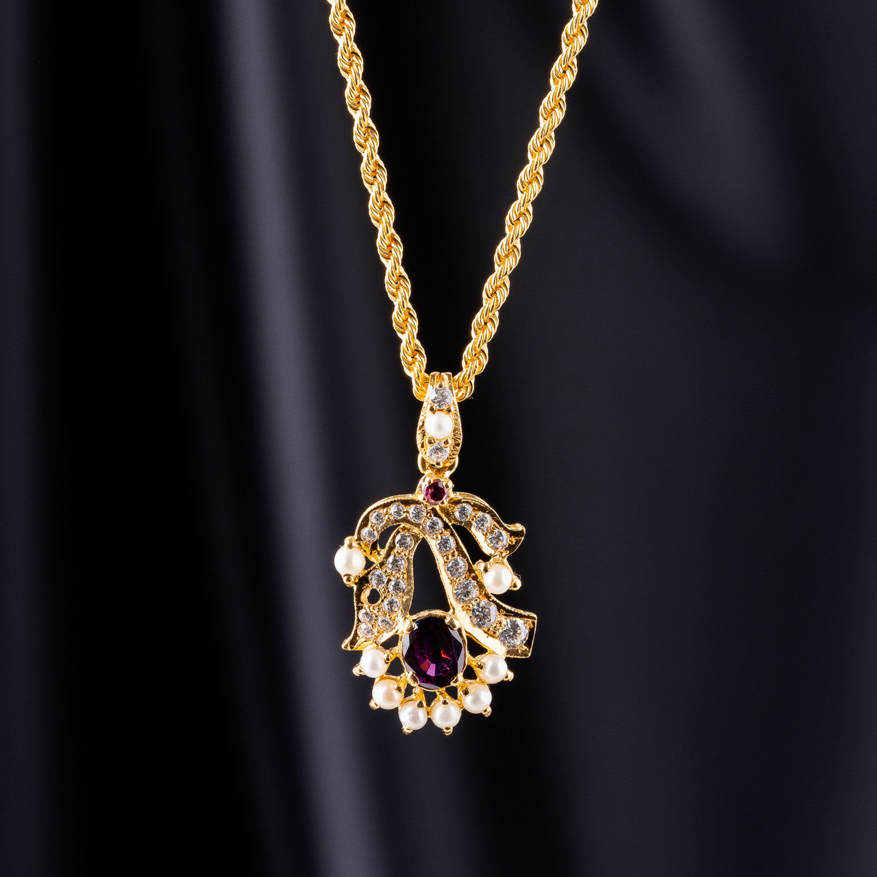 21K Yellow Gold Chain with 22K Ruby & Fresh Water Pearl Pendant

22K GOLD JEWELLERY IN DUBAI
22K GOLD NECKLACE SET
22K PAKISTANI NECKLACE SET
FASHION WEAR NECKLACE
GOLD SET IN DUBAI
SHARJAH GOLD SOUQ
22K LIGHTWEIGHT GOLD NECKLACE