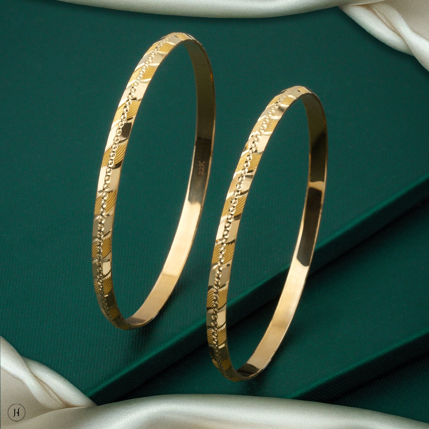 Explore our 22-karat yellow gold bangle designs for ladies with the best prices in Dubai and Sharjah, UAE