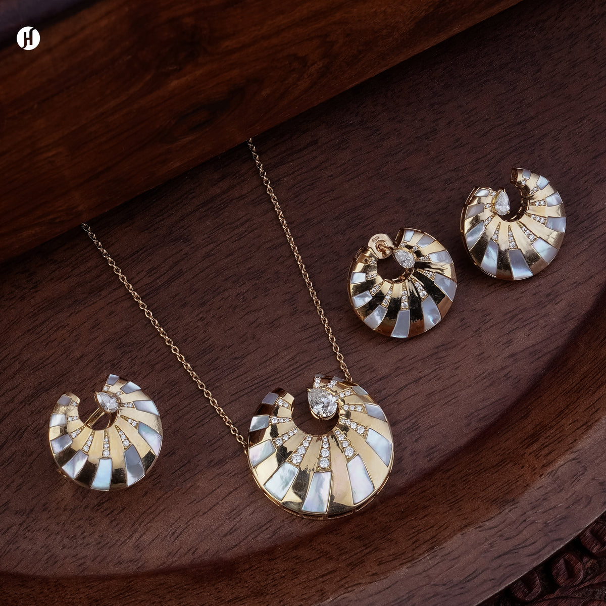 Italian 18K rose gold mother-of-pearl nautilus shell necklace set with matching earrings and ring, modern gold jewellery for women — JH Jewellers, Dubai, UAE