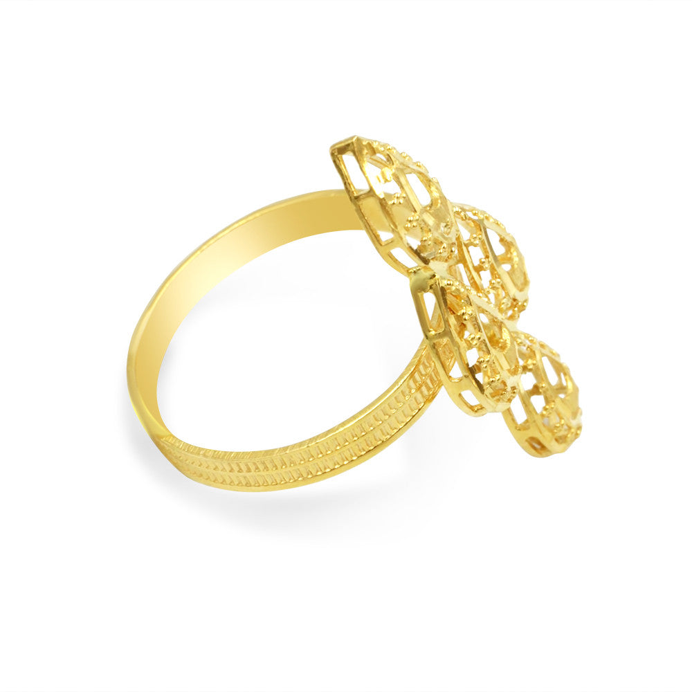 Side profile of 21K yellow gold Saudi ring with motifs arranged in a diamond shape