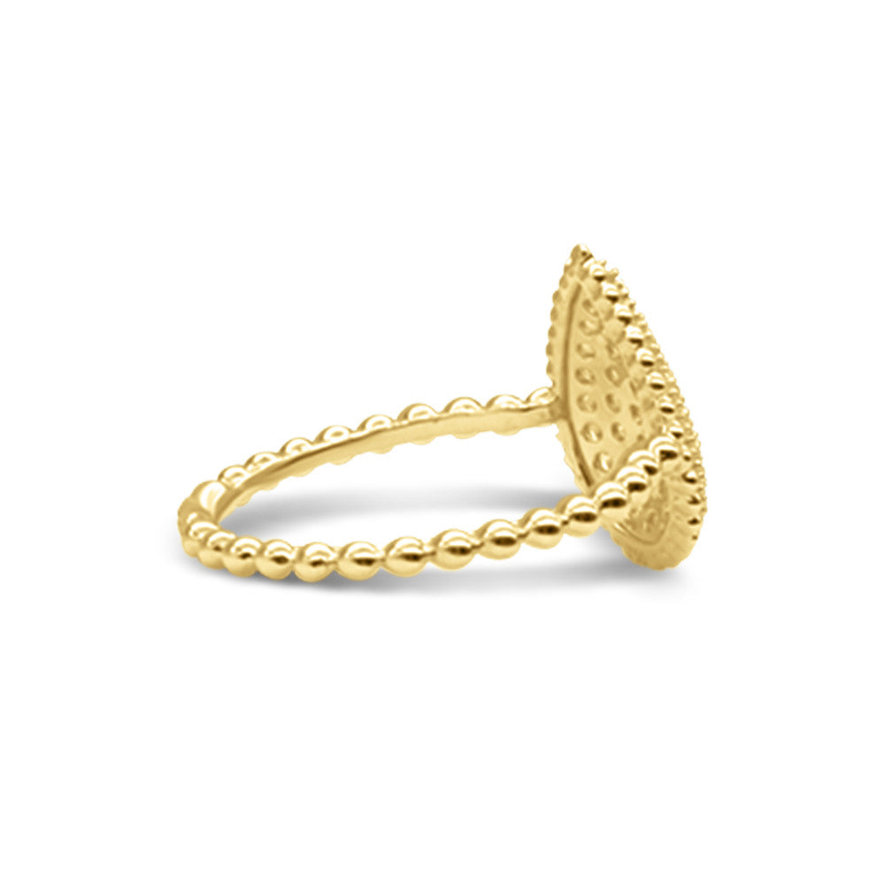 Side profile of 18K Yellow gold Italian Pear ring with milgrain shank