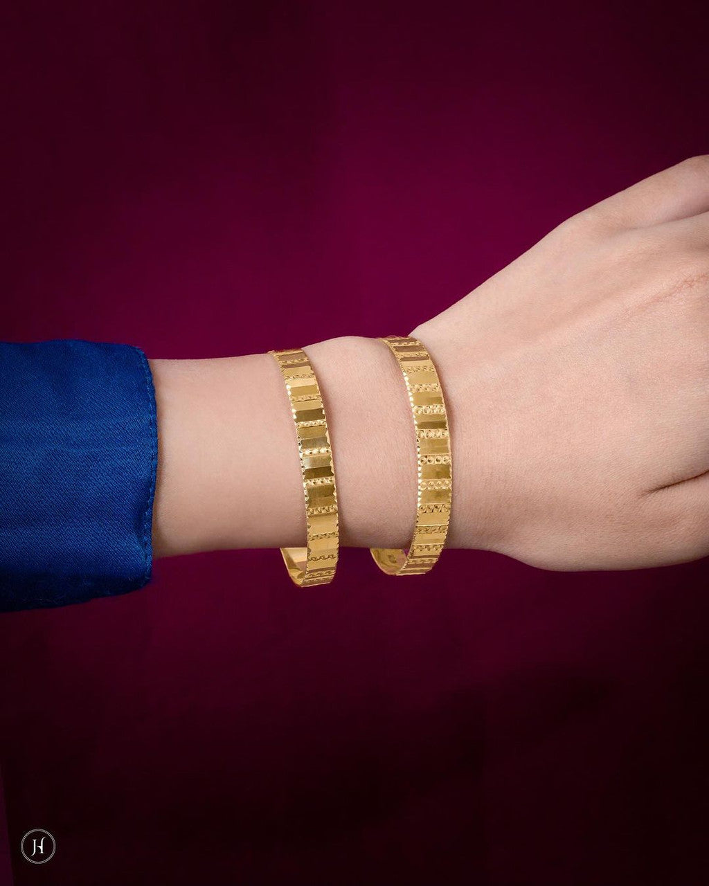 21K Yellow Gold Striped Bangles with alternating smooth and braided pattern designs.